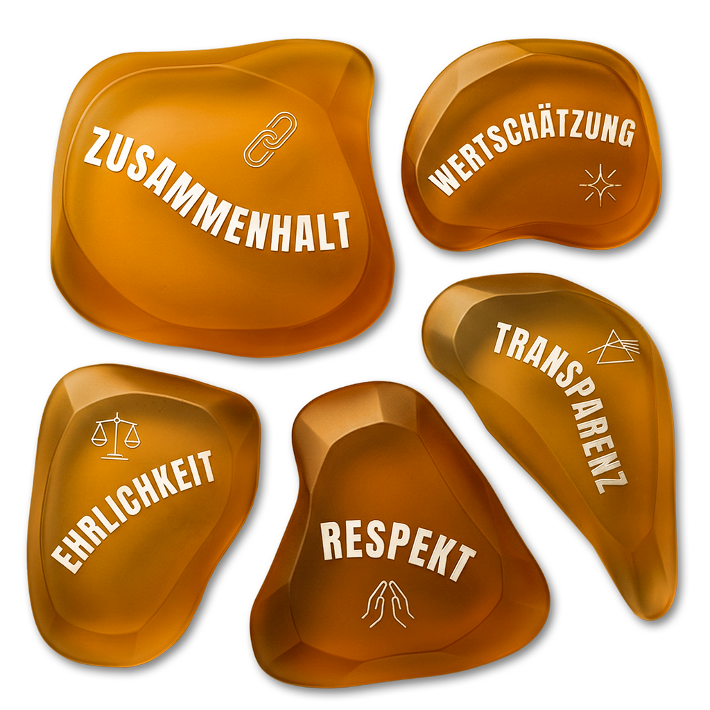 Fünf orangene Kristallsteine mit den Agenturwerten Zusammenhalt, Wertschätzung, Ehrlichkeit, Respekt und Transparenz auf schwarzem Hintergrund.