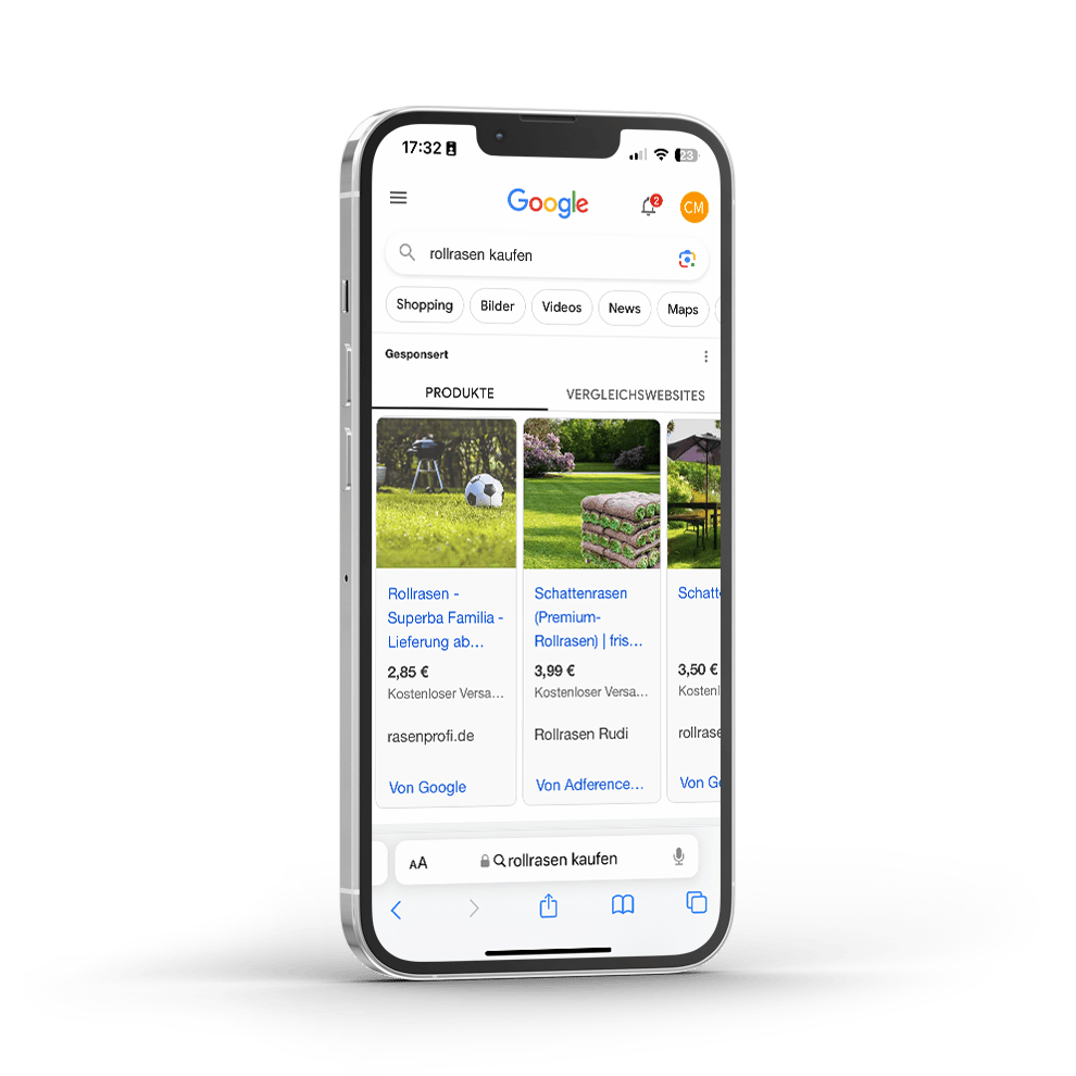 Smartphone zeigt Google-Produktanzeigen mit Rollrasen-Angeboten und symbolisiert mobile Shop-Präsenz.