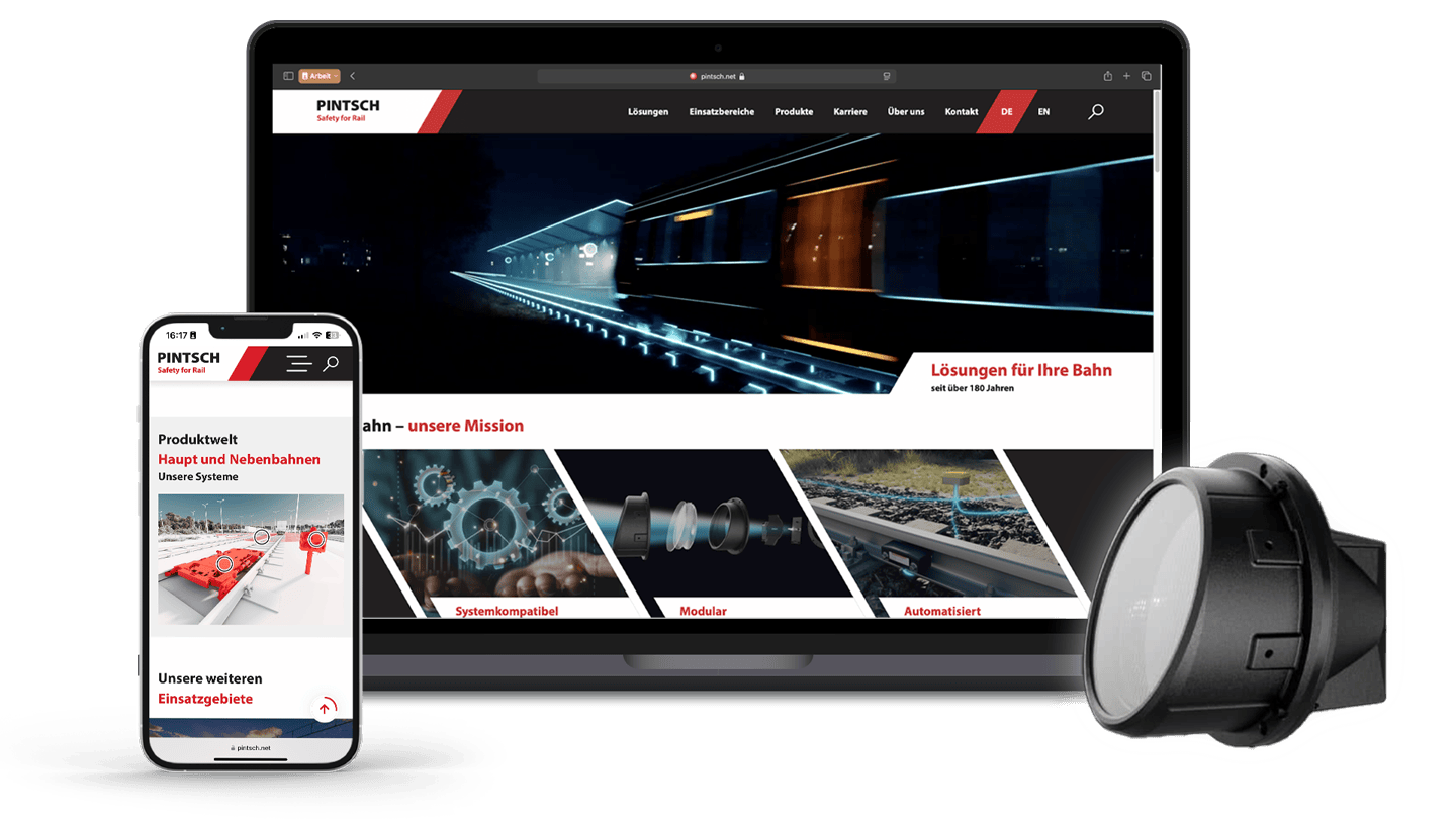 Die PINTSCH-Website wird auf einem Laptop und einem Smartphone dargestellt. Auf dem Bildschirm ist der Mehrfarbenlichtpunkt PINLUXON 550 zu sehen.